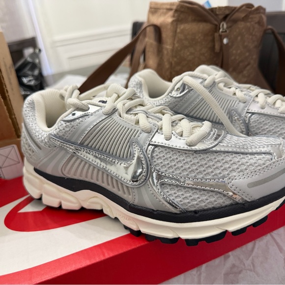 Nike Shoes - Nike Metallic Silver and White Sneakers